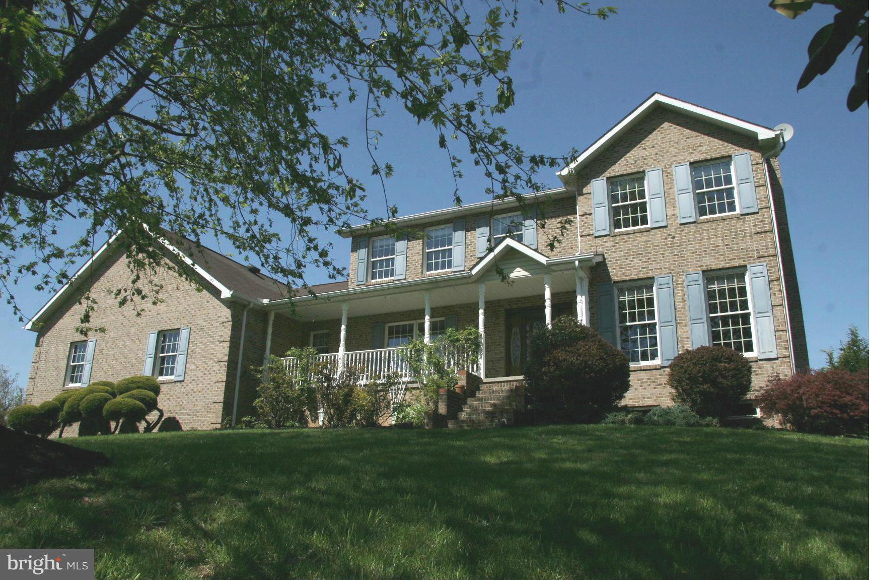 20834 Netz Road Boonsboro, MD 21713 - Photo 28 of 30 a front view of a house with a garden