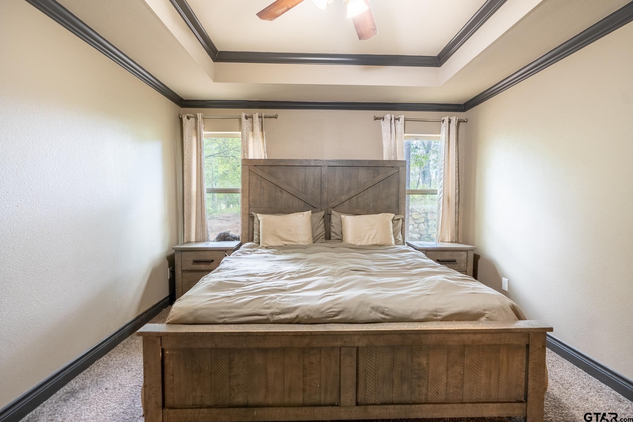 14062 Bent Trail Tyler, TX 75707 - Photo 25 of 46 a bedroom with a bed and window