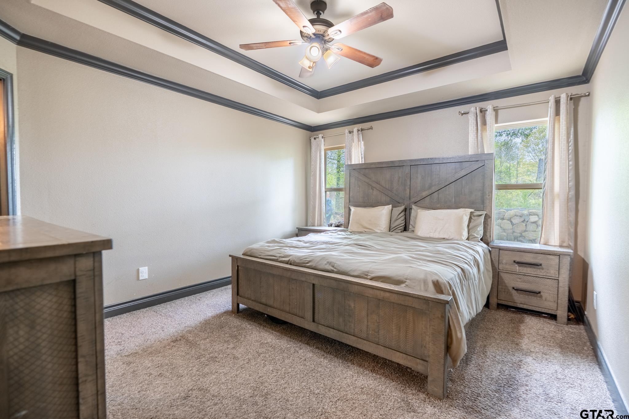 14062 Bent Trail Tyler, TX 75707 - Photo 27 of 46 a bedroom with a bed and window