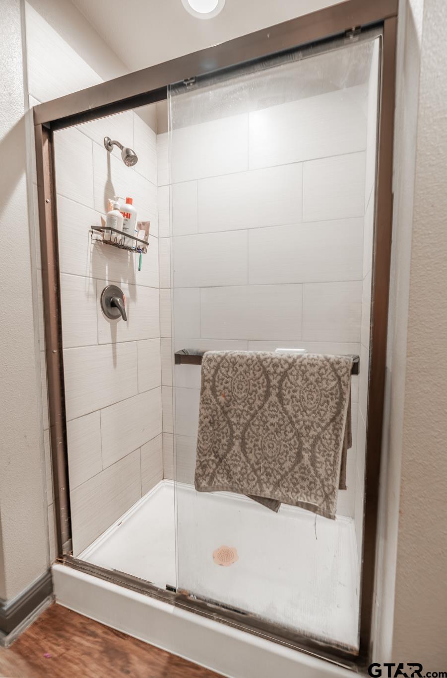 14062 Bent Trail Tyler, TX 75707 - Photo 31 of 46 a bathroom with a bathtub