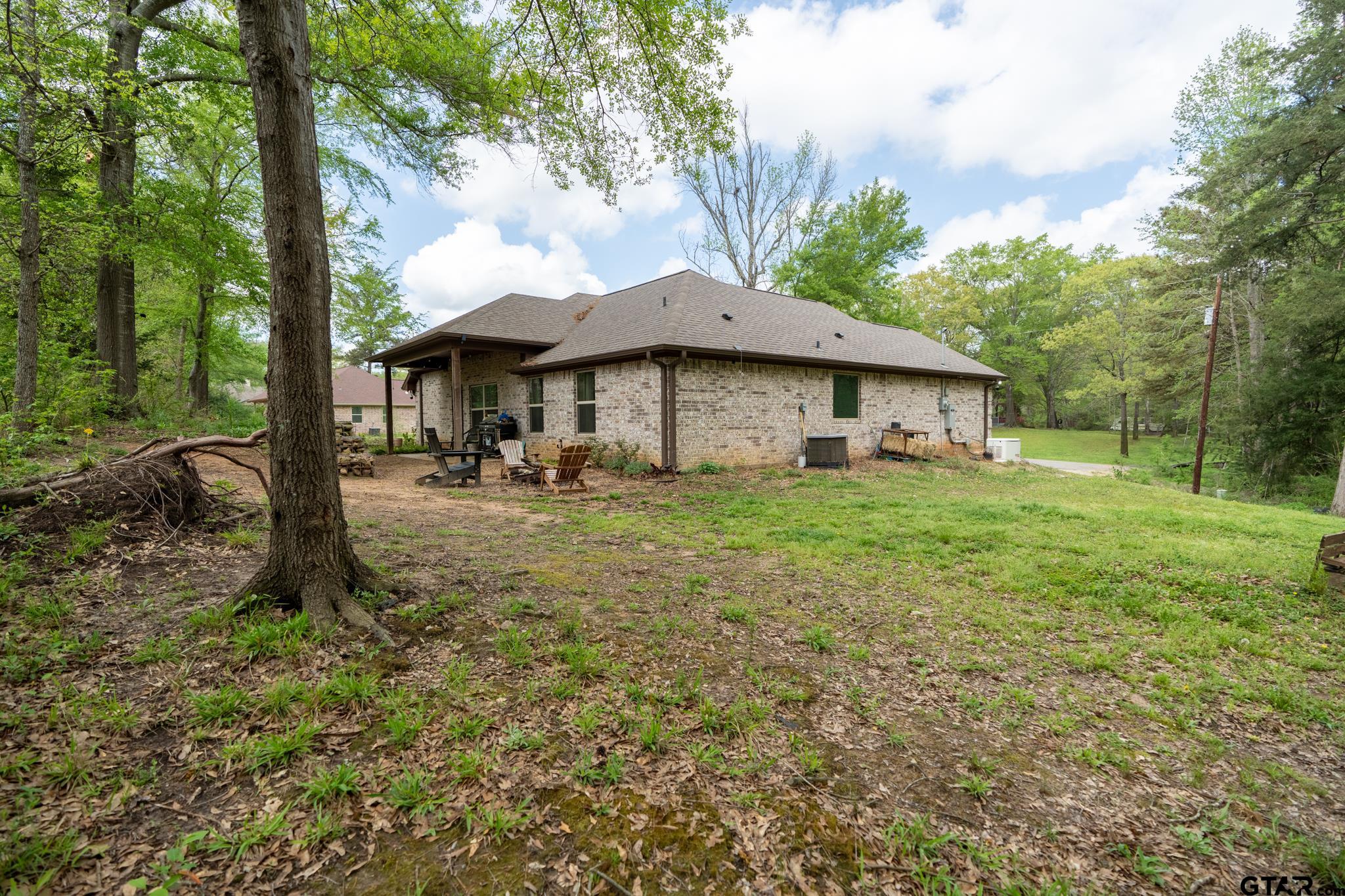 14062 Bent Trail Tyler, TX 75707 - Photo 39 of 46 a front view of a house with garden