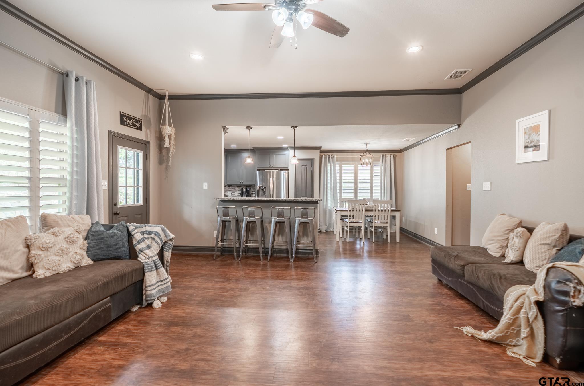 14062 Bent Trail Tyler, TX 75707 - Photo 5 of 46 a living room with furniture and a table