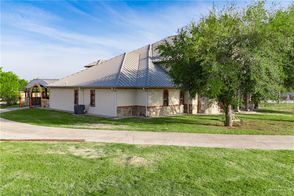 508 El Paisano Road Rio Grande City, TX 78582 - Photo 12 of 40 a front view of a house with a yard