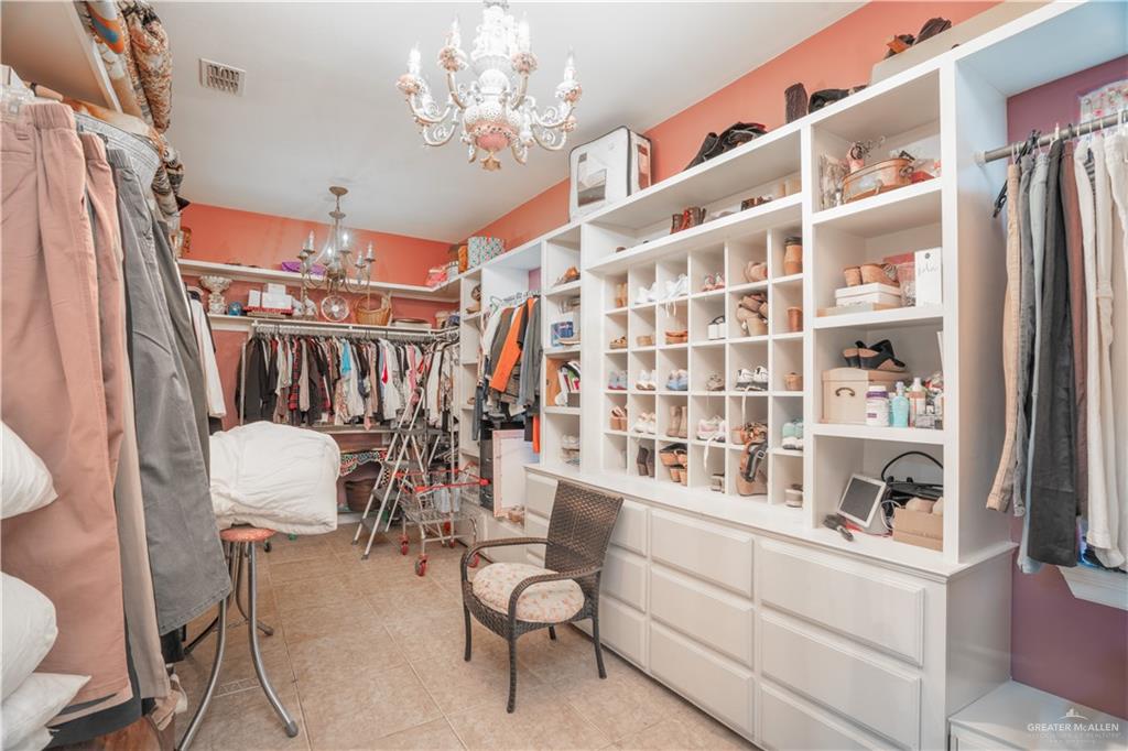 508 El Paisano Road Rio Grande City, TX 78582 - Photo 17 of 40 a view of entryway with furniture and chandelier