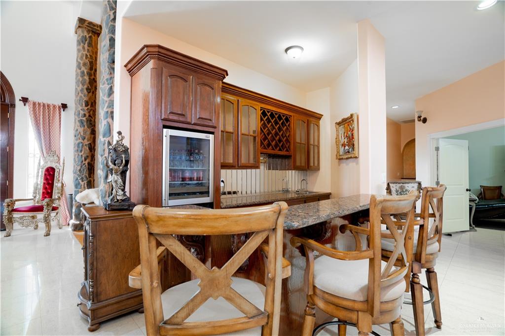 508 El Paisano Road Rio Grande City, TX 78582 - Photo 20 of 40 a view of a dining room with furniture and window