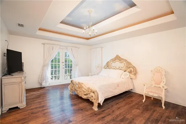 a bathroom with a double vanity sink mirror and shower