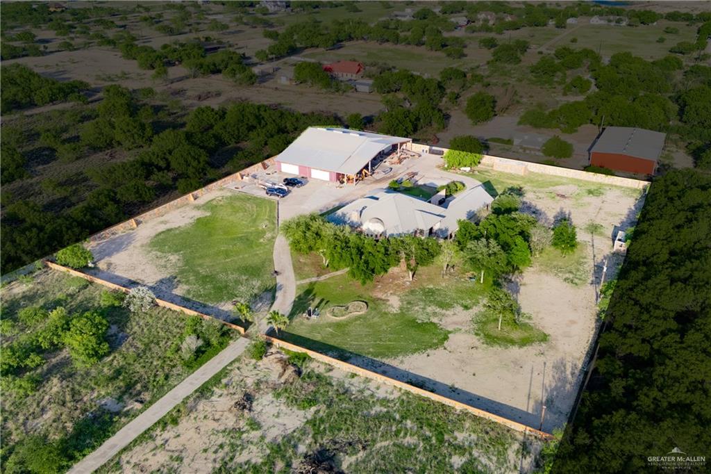 508 El Paisano Road Rio Grande City, TX 78582 - Photo 10 of 40 an aerial view of a house with a yard and lake view