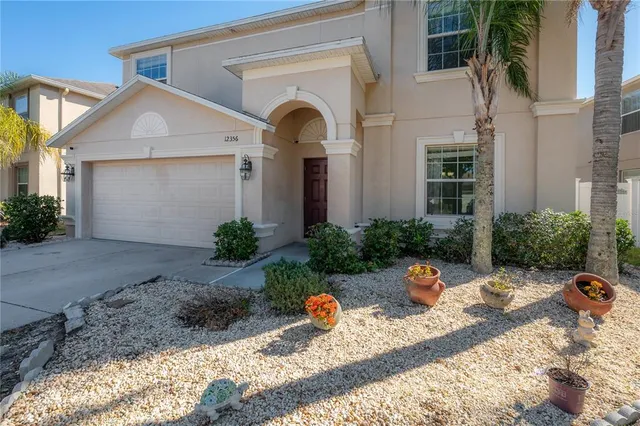 a front view of a house with patio