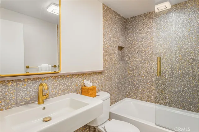 a bathroom with a sink and a bathtub