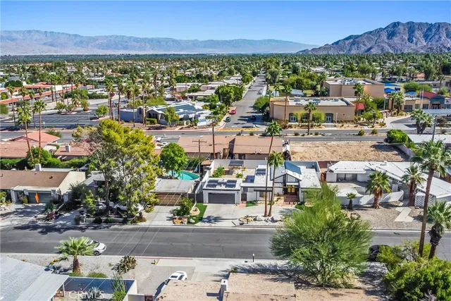 a view of a city with a lake