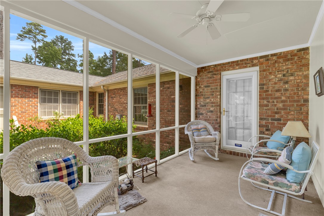 203 Fox Creek Road Anderson, SC 29621 - Photo 28 of 36 Relax and unwind in this inviting screened-in porch, offering a seamless blend of comfort and outdoor living.