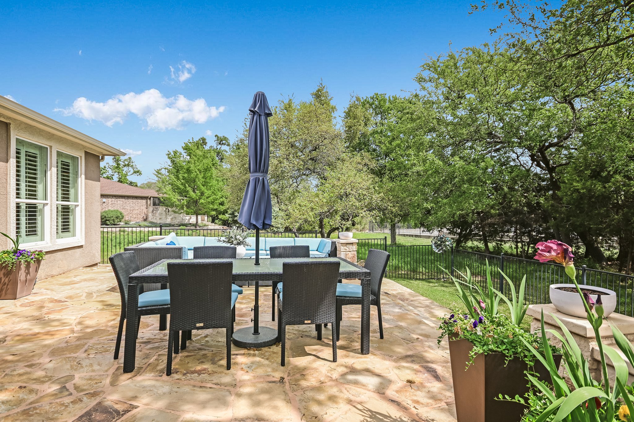 304 Coffee Mill Creek Road Georgetown, TX 78633 - Photo 23 of 30 Dining area and beautiful Oklahoma stone decking