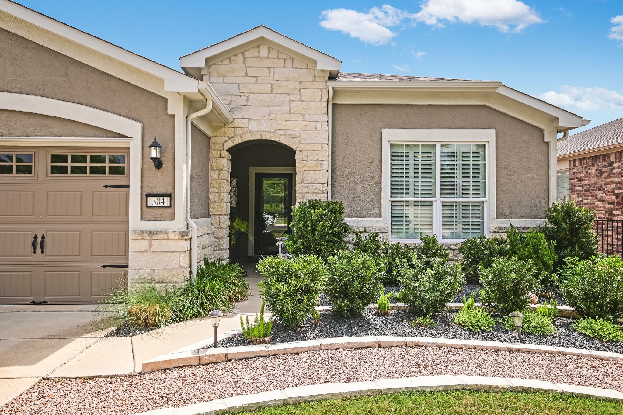 304 Coffee Mill Creek Road Georgetown, TX 78633 - Photo 3 of 30 Professional evergreen and perennial landscaping