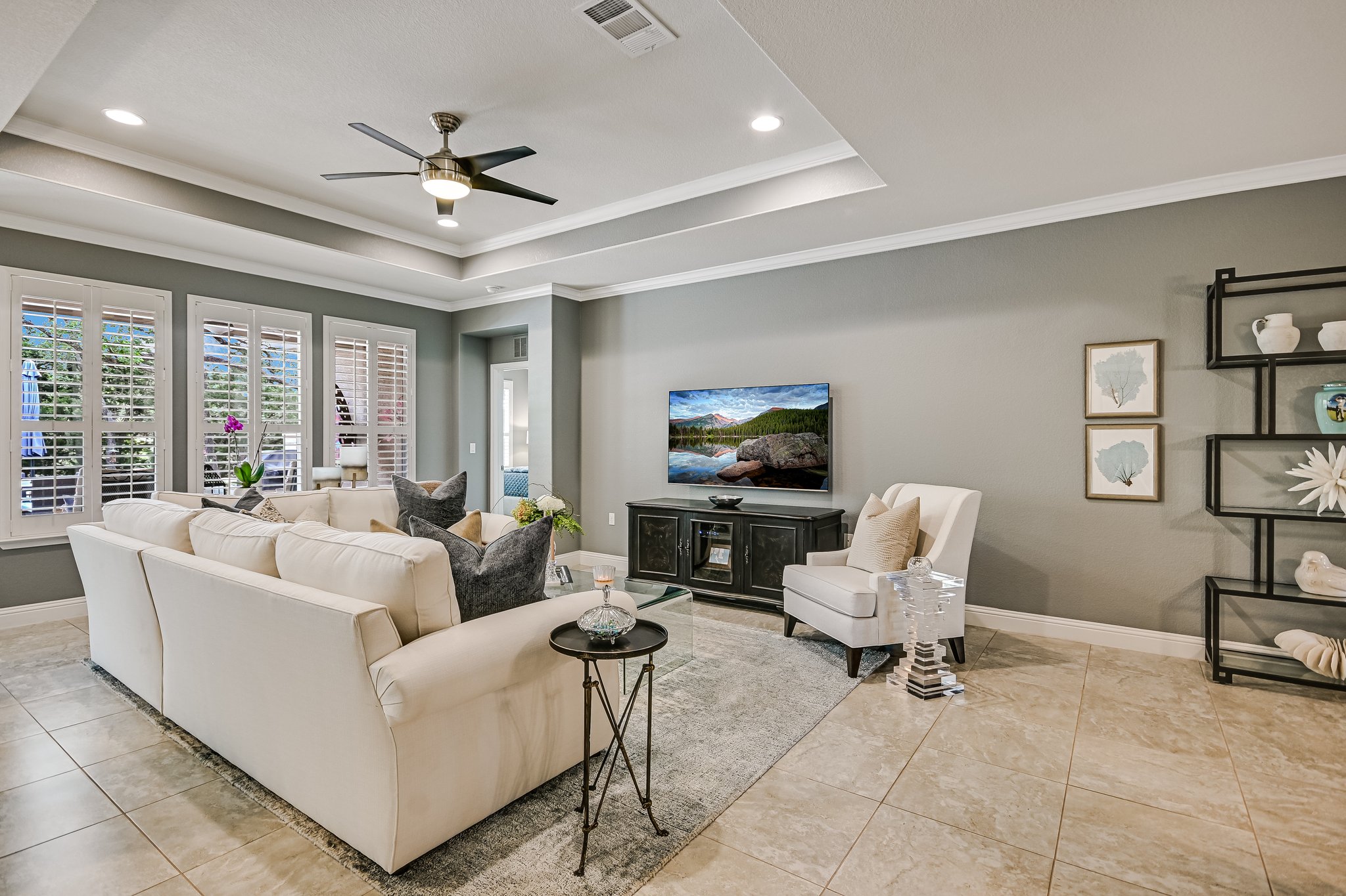 304 Coffee Mill Creek Road Georgetown, TX 78633 - Photo 9 of 30 The living room flows to the kitchen and dining areas for seamless living and entertaining. Plantation shutters throughout home