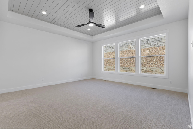 710 East Mountain Road North Ogden, UT 84414 - Photo 13 of 36 Empty room with a tray ceiling, light carpet, wooden ceiling, ceiling fan, and recessed lighting