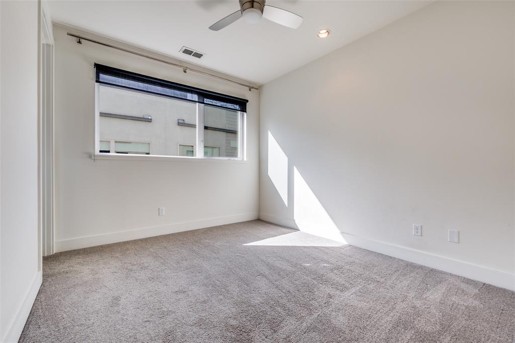 4610 Steel Street Dallas, TX 75219 - Photo 17 of 18 a view of an empty room with a window