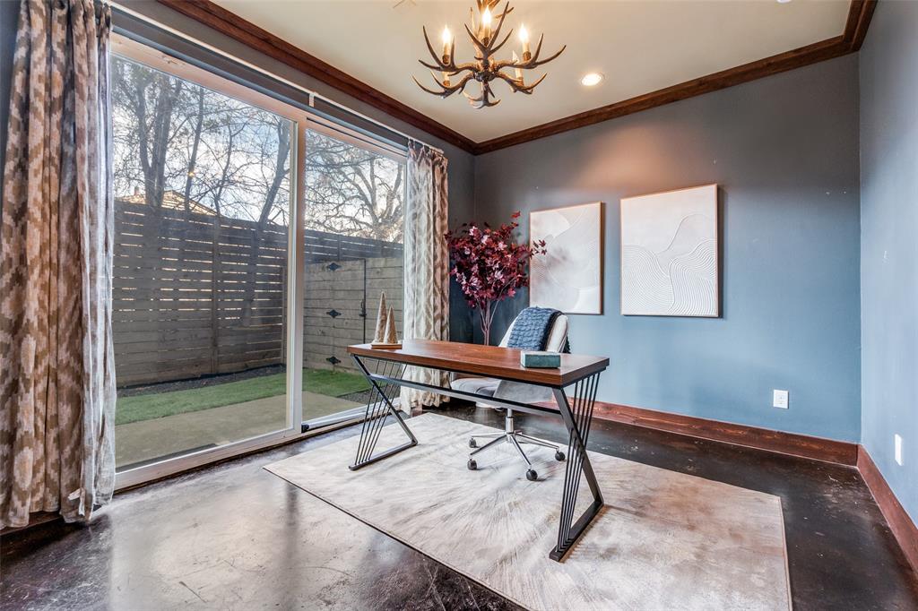 4610 Steel Street Dallas, TX 75219 - Photo 5 of 18 a workspace with furniture and window