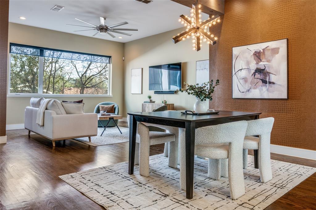 4610 Steel Street Dallas, TX 75219 - Photo 7 of 18 a living room with furniture and a large window