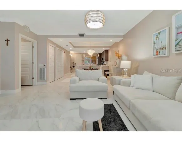 a living room with furniture and a couch