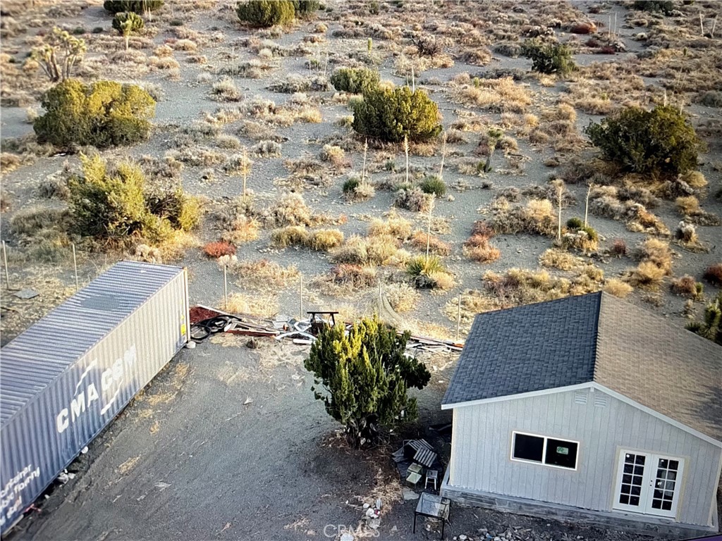 3123 Coyote Road Phelan, CA 92371 - Photo 4 of 7 a view of house with yard