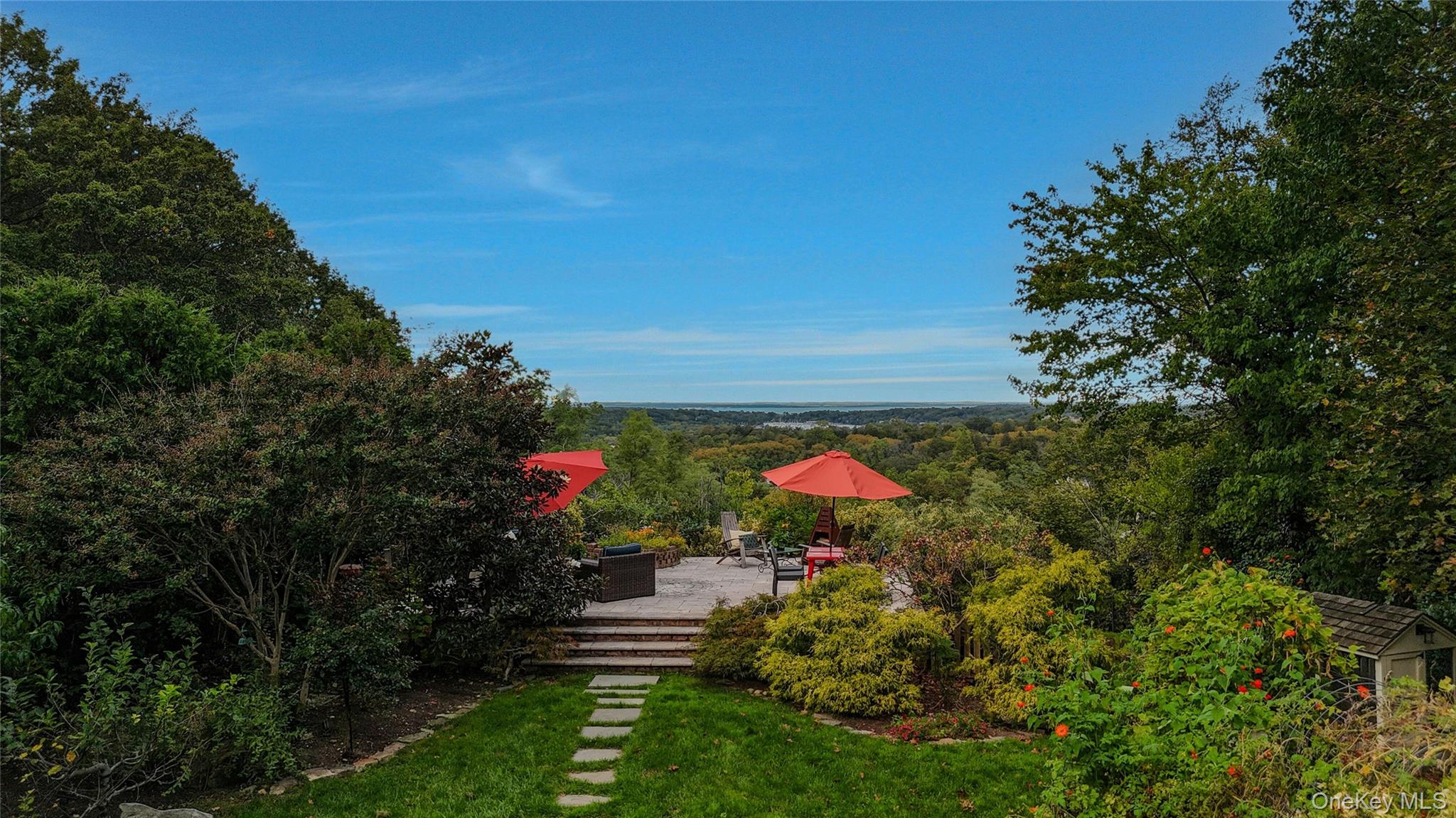 35 Semon Road Huntington, NY 11743 - Photo 2 of 4 a view of a house with a small yard and a forest