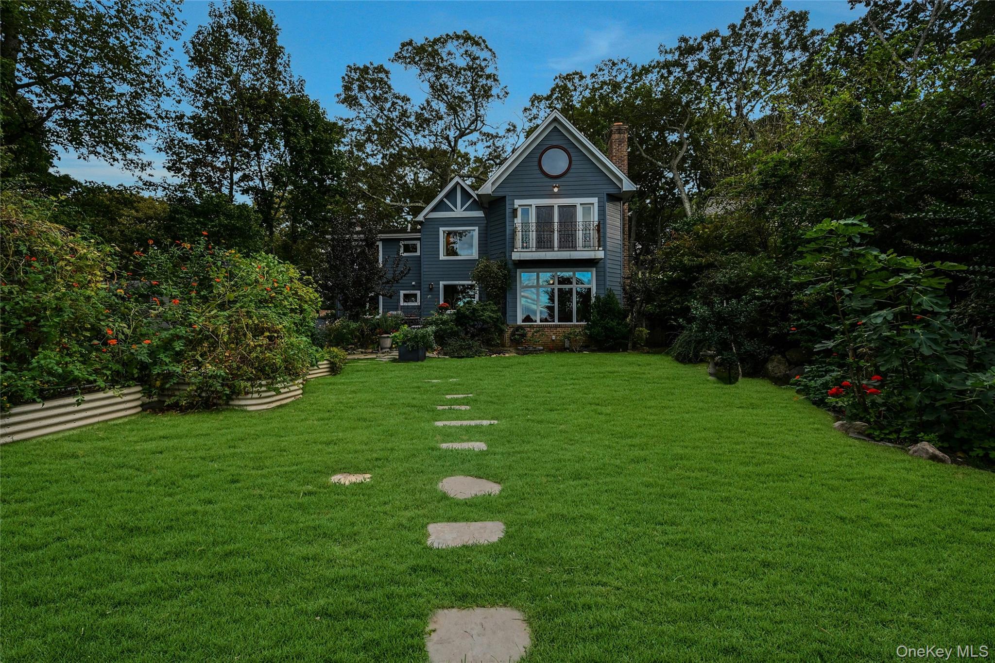 35 Semon Road Huntington, NY 11743 - Photo 3 of 4 a front view of a house with garden