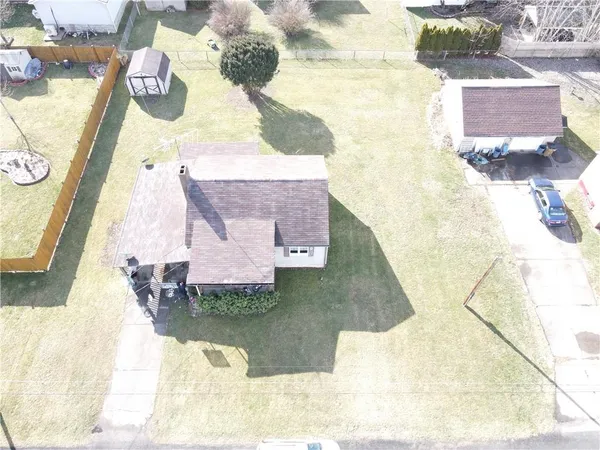 with aerial view of a house with a swimming pool