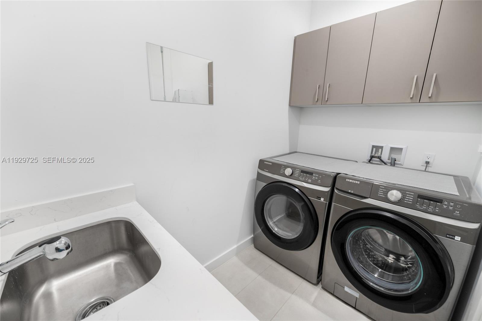 2756 Southwest 34th Court, Unit B Miami, FL 33133 - Photo 22 of 33 a utility room with dryer and washer