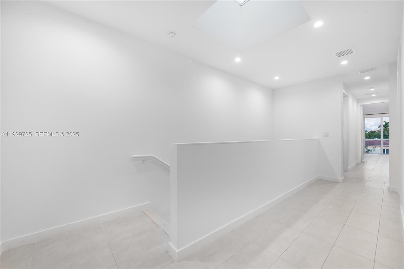 2756 Southwest 34th Court, Unit B Miami, FL 33133 - Photo 23 of 33 a view of an empty room