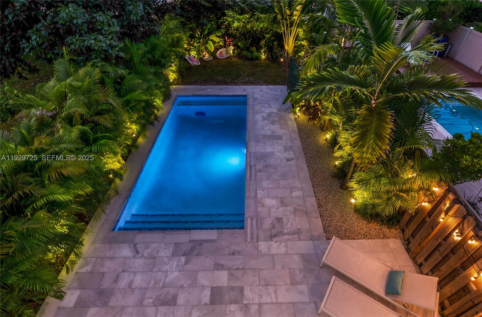 2756 Southwest 34th Court, Unit B Miami, FL 33133 - Photo 30 of 33 a view of a backyard with plants