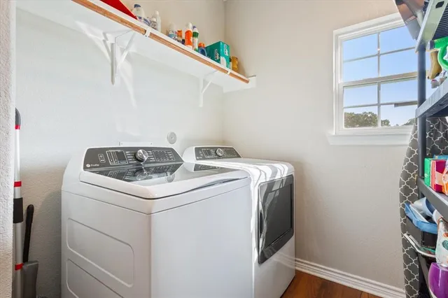 a utility room with dryer and washer