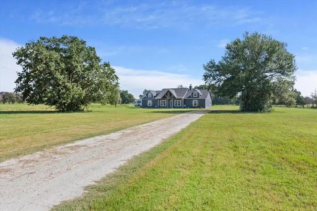 a view of a swimming pool and an outdoor space