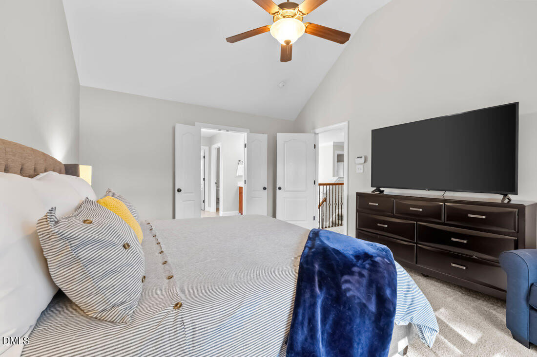 170 Valley Pines Circle Spring Lake, NC 28390 - Photo 29 of 55 a bedroom with a bed and a flat screen tv