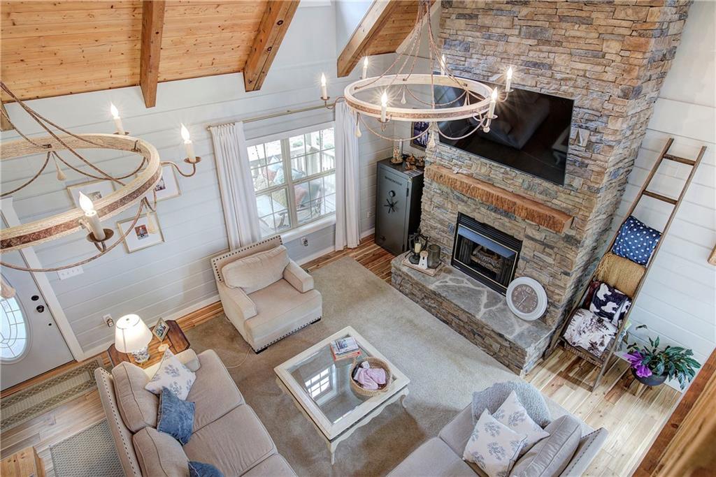 566 Old Grade Road Resaca, GA 30735 - Photo 13 of 48 a living room with furniture and a fireplace