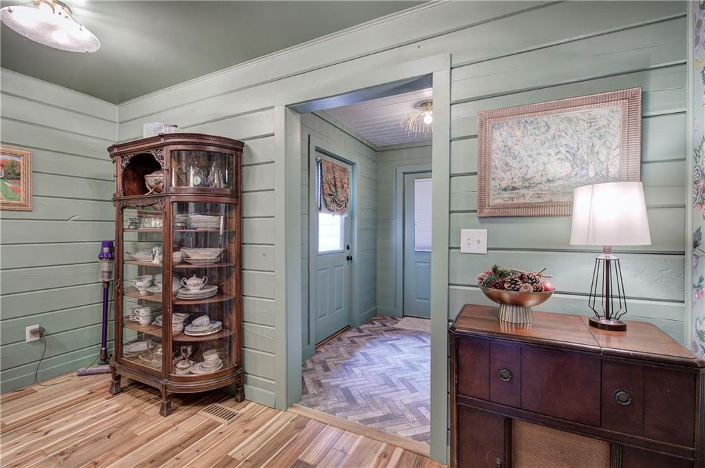 566 Old Grade Road Resaca, GA 30735 - Photo 22 of 48 a bedroom with a bed and a lamp on dresser