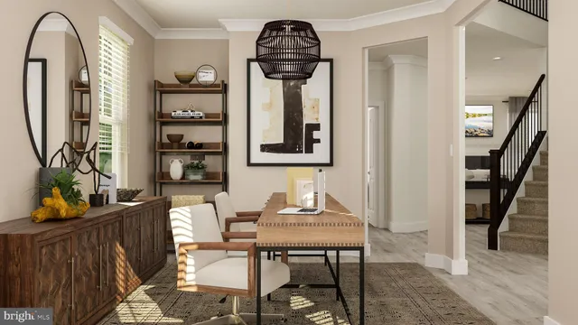a view of a livingroom with furniture and staircase