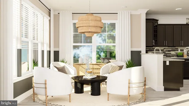 a living room with furniture a table and chairs