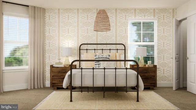 a bedroom with furniture and a window