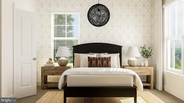 a bedroom with a bed and a lamp next to a window