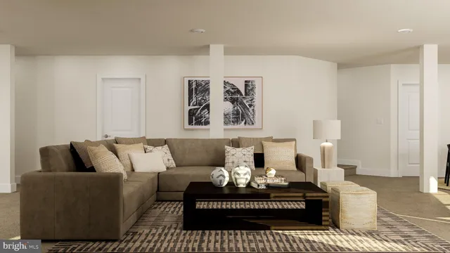 a living room with furniture and a rug