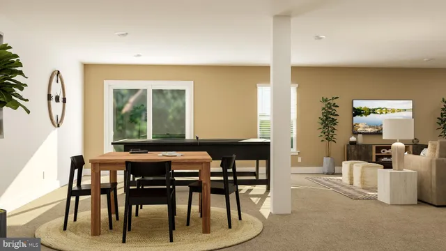 a view of a dining room with furniture and window