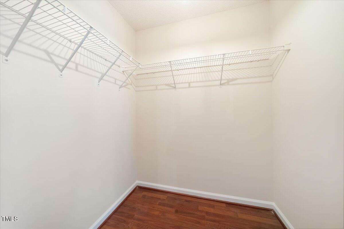 5305 Corinthian Way Raleigh, NC 27607 - Photo 15 of 21 a view of a room with racks on the wall