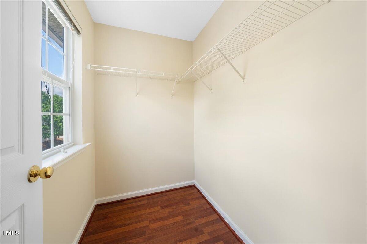 5305 Corinthian Way Raleigh, NC 27607 - Photo 17 of 21 a view of a small space with wooden floor and a window