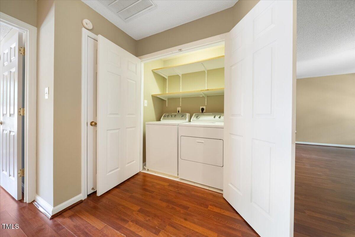 5305 Corinthian Way Raleigh, NC 27607 - Photo 20 of 21 a bathroom with a sink and a mirror