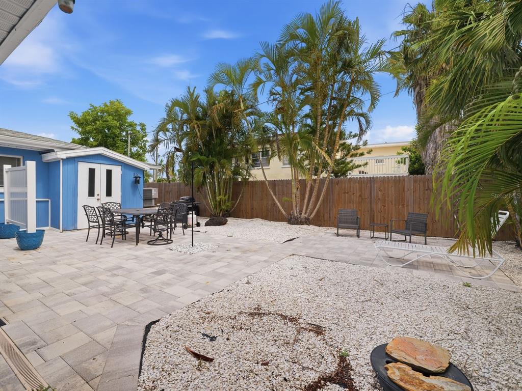 1207 1st Street Indian Rocks Beach, FL 33785 - Photo 30 of 60 a view of a backyard with a patio
