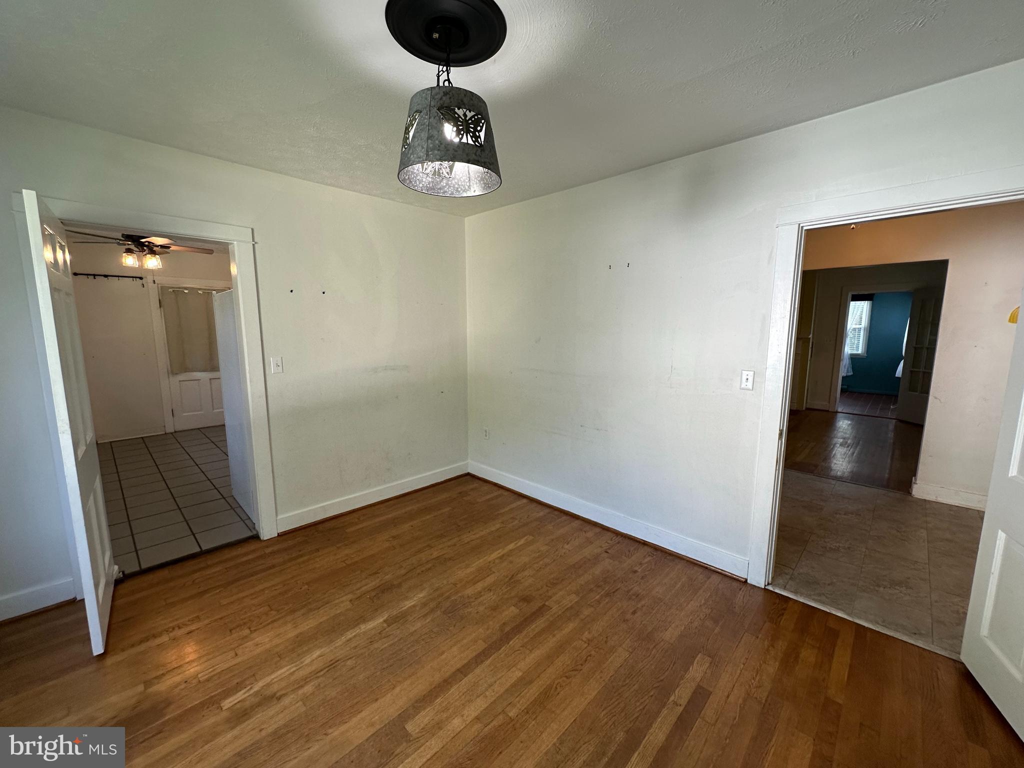 2 Terrace Lane Luray, VA 22835 - Photo 14 of 35 an empty room with wooden floor and staircase