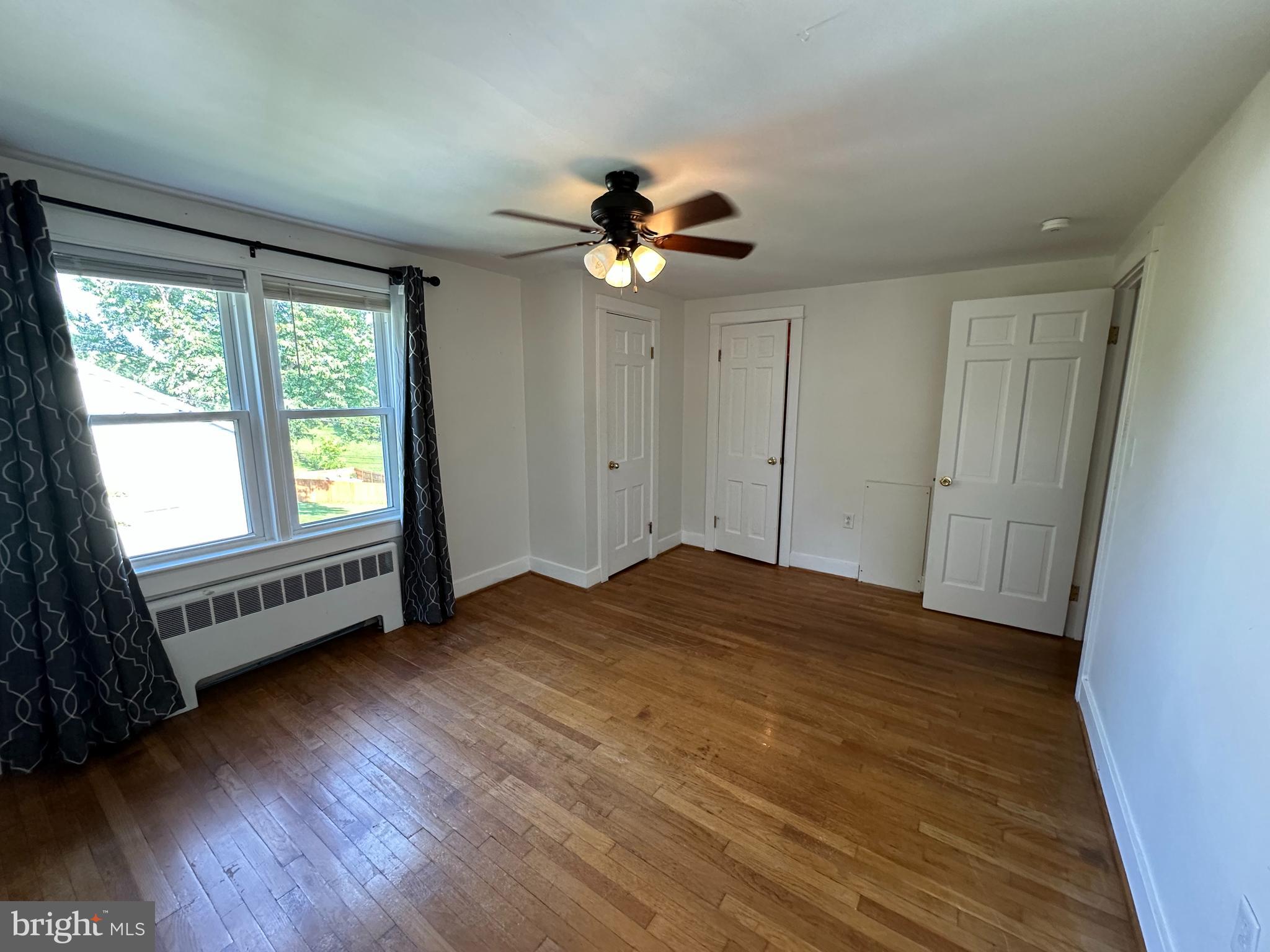 2 Terrace Lane Luray, VA 22835 - Photo 23 of 35 a view of empty room with wooden floor and fan