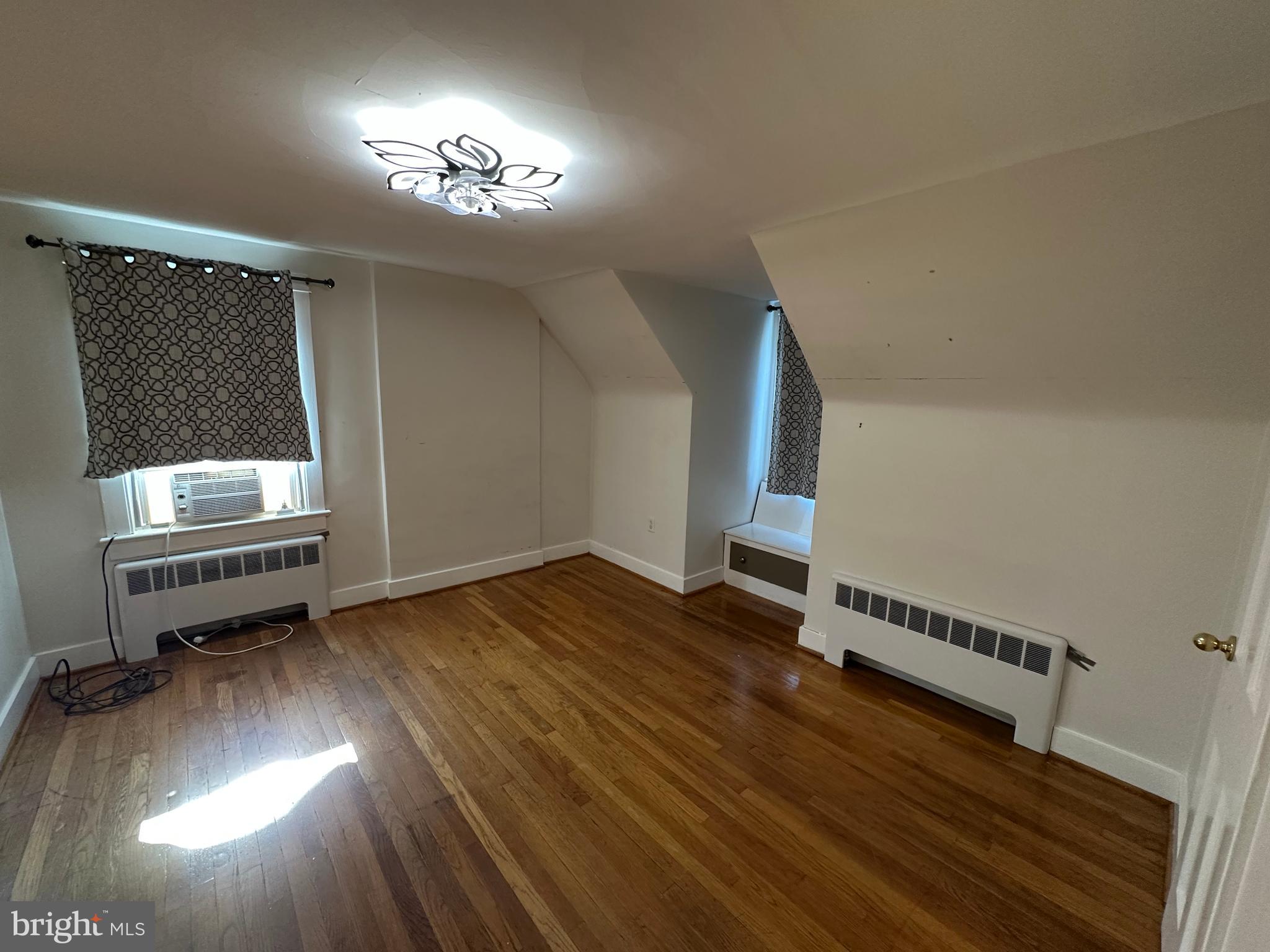 2 Terrace Lane Luray, VA 22835 - Photo 26 of 35 a view of a room with wooden floor staircase and a kitchen space