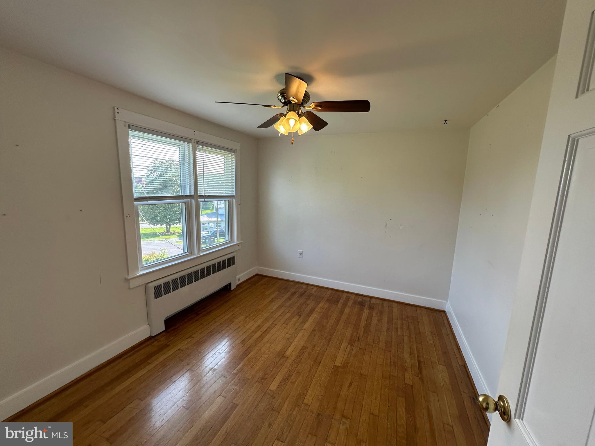 2 Terrace Lane Luray, VA 22835 - Photo 29 of 35 wooden floor in an empty room with a window