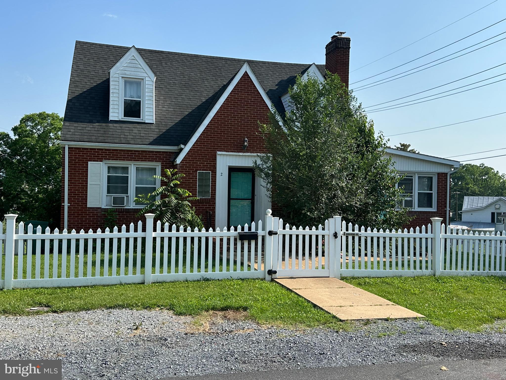 2 Terrace Lane Luray, VA 22835 - Photo 3 of 35 a front view of a house with a garden